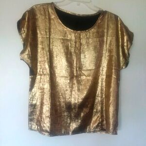 Gold top in size small.